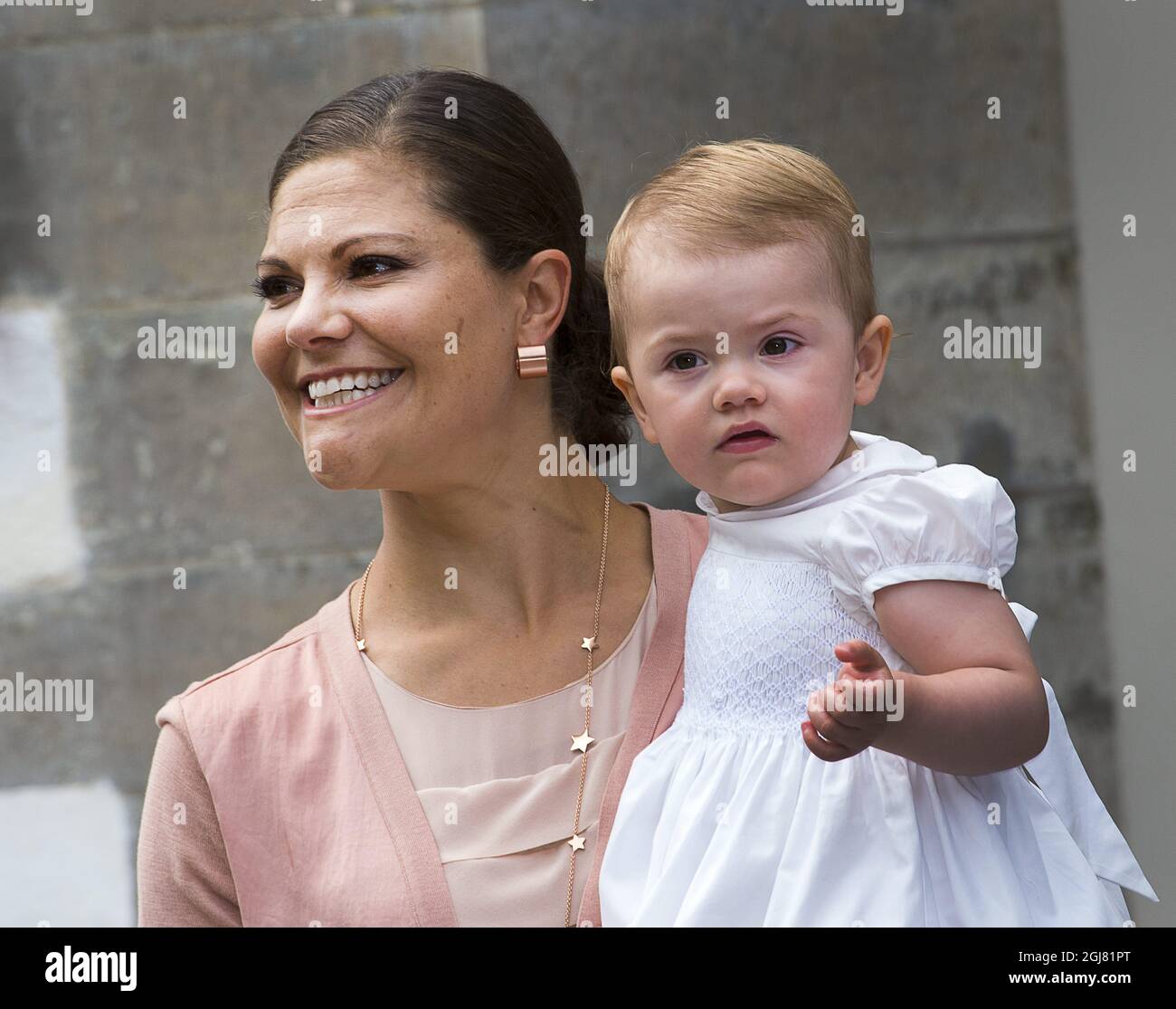 BORGHOLM 20130714 Swedish Crown Princess Victoria and her daughter Princesse Estelle, at the courtyard of the royal family's summer residence Solliden, on the island of Oeland, Sweden, on July 14, 2012, during the celebrations of Crown Princess Victorias 36th birthday. Photo: Jonas Ekstromer / SCANPIX / code 610030  Stock Photo
