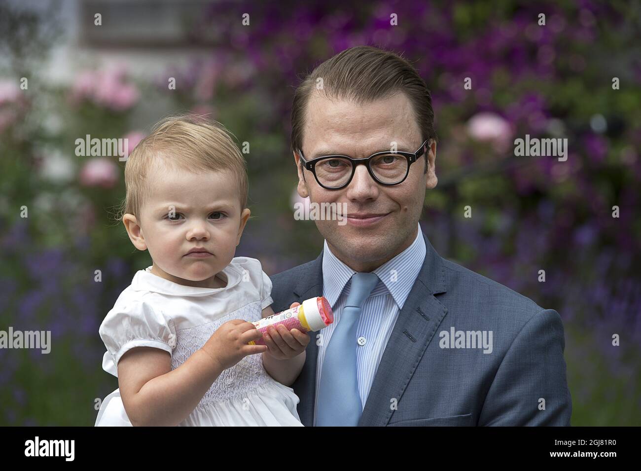 BORGHOLM 20130714 Swedish Prince Daniel and his daughter Princess Estelle, at the courtyard of the royal family's summer residence Solliden, on the island of Oeland, Sweden, on July 14, 2012, during the celebrations of Crown Princess Victorias 36th birthday. Photo: Jonas Ekstromer / SCANPIX / code 610030  Stock Photo