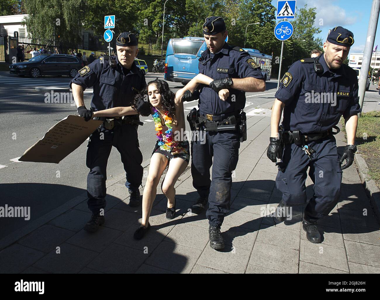 STOCKHOLM 20130801 Four activists from the feminist organization FEMEN conducted a campaign on Thursday morning at the Russian embassy in Stockholm to protest against Russian anti-gay laws. Two of the activists entered the embassy area. The police was called to the site and the women were arrested thereafter for trespassing. This week Stockholm Pride Festival is taking place. Foto Jonas Ekstromer / SCANPIX kod 10030  Stock Photo
