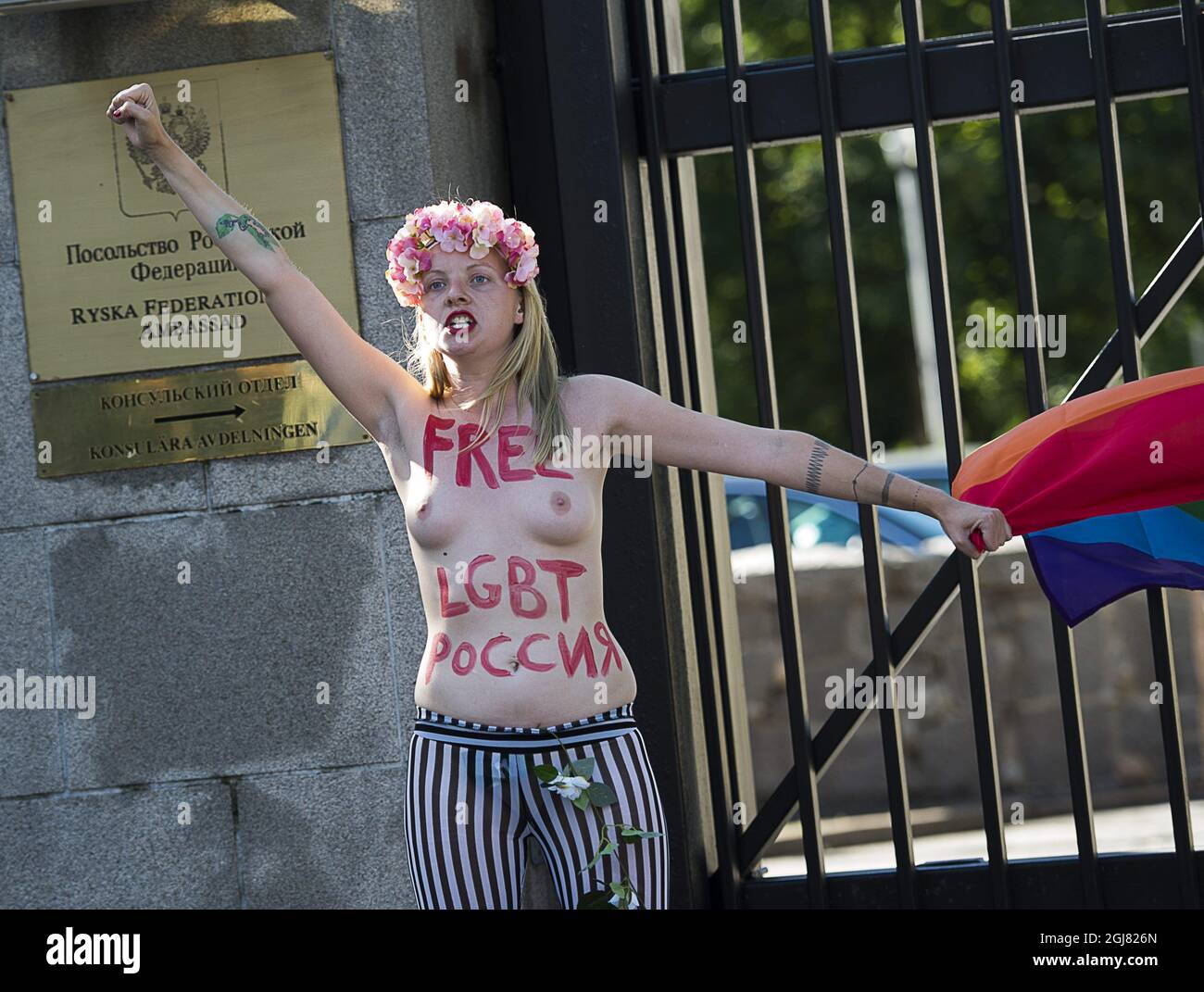 STOCKHOLM 20130801 Four activists from the feminist organization FEMEN conducted a campaign on Thursday morning at the Russian embassy in Stockholm to protest against Russian anti-gay laws. Two of the activists entered the embassy area. The police was called to the site and the women were arrested thereafter for trespassing. This week Stockholm Pride Festival is taking place. Foto Jonas Ekstromer / SCANPIX kod 10030  Stock Photo