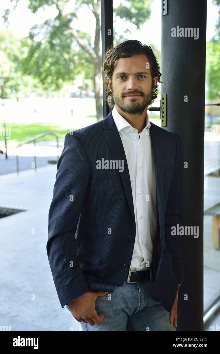 STOCKHOLM 20130812 Prince Carl Philip stands behind the idea and concept development of "The Swedish Red List," a new series of plates and bowls from porcelain maker Rorstrand presented on Monday, August 12, 2013 Not pictured designer Anna Lerinder and illustrator Stefan Horberg created the series with images of endangered Swedish plants and animals. Foto: Henrik Montgomery / SCANPIX / kod: 10060  Stock Photo