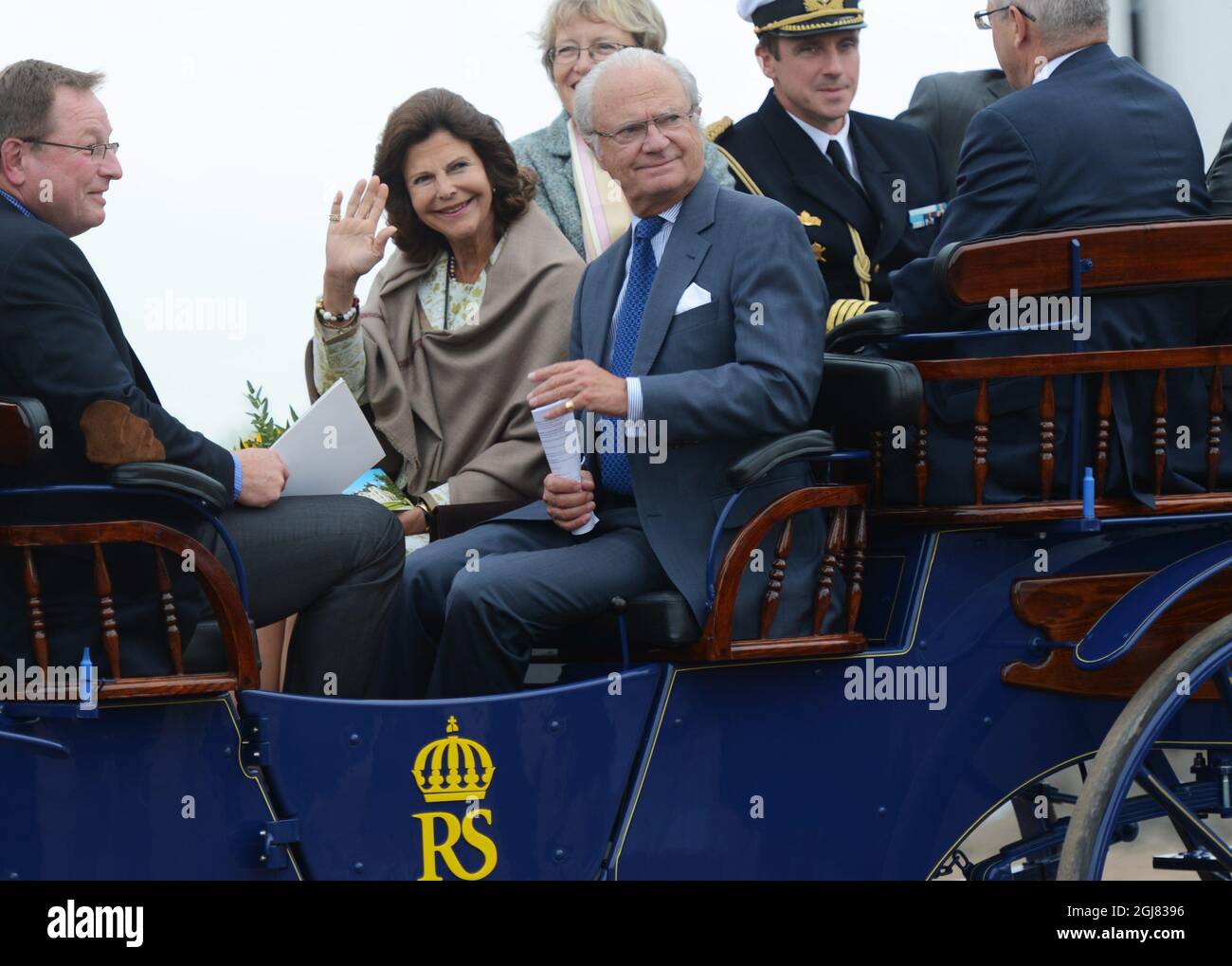 STROMSHOLM 20130830 King Carl Gustaf and Queen Silvia are seen arriving to the Stromsholms riding school i Stromsholm, Sweden, August 30, 2013. The visit is a part of the Kings ongoing 40 year anniversary on the throne. Foto: Fredrik Sandberg / SCANPIX / Kod 10080  Stock Photo