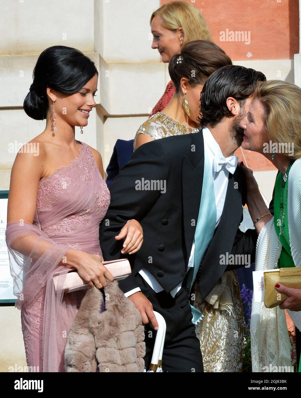 STOCKHOLM 2013-08-31 Sofia Hellqvist, Prince Carl Philip and Queen Sonja after the wedding at the Ulriksdal Palace Chapel in Stockholm, Sweden, August 31, 2013. The Swedish Kings godson Gustaf Magnuson (son of Princess Christina and Tord Magnuson) married model Vicky AndrÃ©n Saturday. Photo Jonas Ekstromer / SCANPIX / ** SWEDEN OUT ** Stock Photo