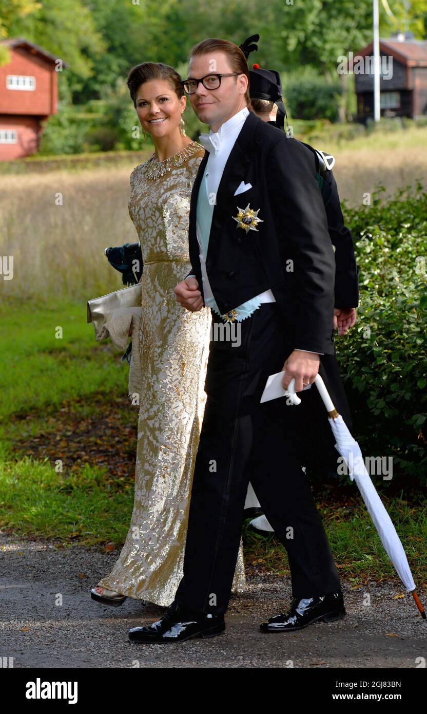 STOCKHOLM 2013-08-31 Crown Princess Victoria and Prince Daniel after the wedding at the Ulriksdal Palace Chapel in Stockholm, Sweden, August 31, 2013. The Swedish Kings godson Gustaf Magnuson (son of Princess Christina and Tord Magnuson) married model Vicky AndrÃ©n Saturday. Photo Jonas Ekstromer / SCANPIX / ** SWEDEN OUT ** Stock Photo