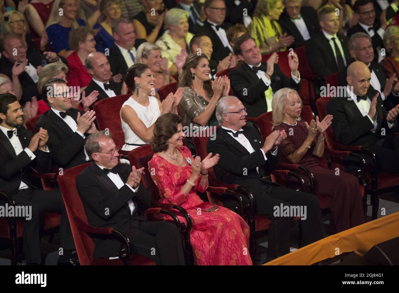 STOCKHOLM 20130914 Prince Carl Philip, Prince Daniel, Crown Princess Victoria, Princess Madeleine, Mr Christopher O'Neill and in front of them Queen Silvia and King Carl Gustaf between Per Westerberg, the speaker of the PArliament and his wife Ylwa Westerberg at the Swedish Riksdag's jubilee concert in connection with The King's 40th jubilee, held at the Concert Hall in Stockholm September 14, 2013. Photo: Fredrik Sandberg / SCANPIX / Kod 10080  Stock Photo