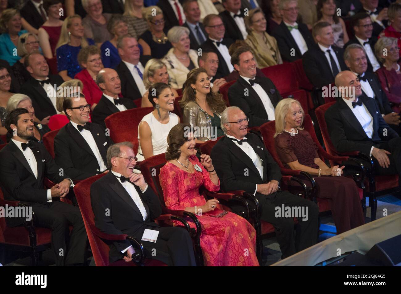 STOCKHOLM 20130914 Prince Carl Philip, Prince Daniel, Crown Princess Victoria, Princess Madeleine, Mr Christopher O'Neill and in front of them Queen Silvia and King Carl Gustaf between Per Westerberg, the speaker of the PArliament and his wife Ylwa Westerberg at the Swedish Riksdag's jubilee concert in connection with The King's 40th jubilee, held at the Concert Hall in Stockholm September 14, 2013. Photo: Fredrik Sandberg / SCANPIX / Kod 10080  Stock Photo