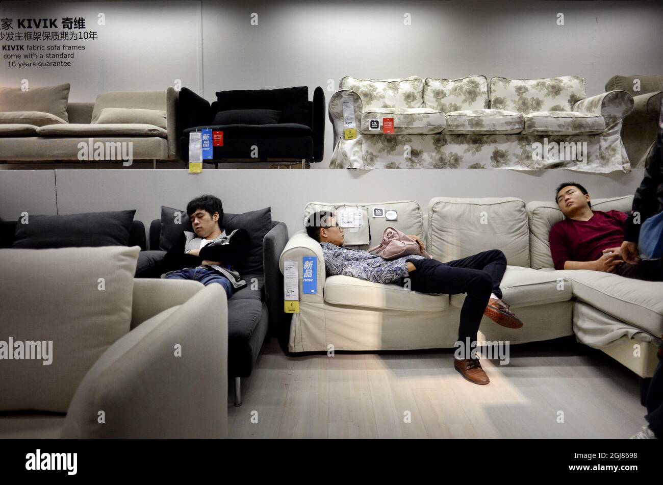 KINA 2013-09-27 Customers at an IKEA furniture store in China September,  2013. Customers falling asleep in the beds and sofas of IKEA are not  unusual in China. But thatÂ's not a problem