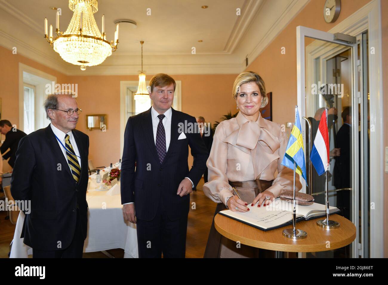 STOCKHOLM 2013-10-14 King Willem-Alexander and Queen Maxima of the Netherlands met with Sweden's Speaker of the Parliament, Per Westerberg at the Parliament in Stockholm on October 14, 2013. The Dutch Royals are on a one day visit to Sweden. Foto Anders Wiklund / TT / kod 10040  Stock Photo