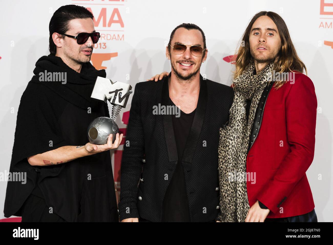 AMSTERDAM 20131110 Members of US rock band Thirty seconds to Mars (from LtoR) Tomo Milicevic, Shannon Leto and Jared Leto pose with their award during the 2013 MTV Europe Music Awards held at the Ziggo Dome in Amsterdam, Netherlands, Sunday November 10, 2013. Foto: Vilhelm Stokstad / TT / Kod 11370  Stock Photo