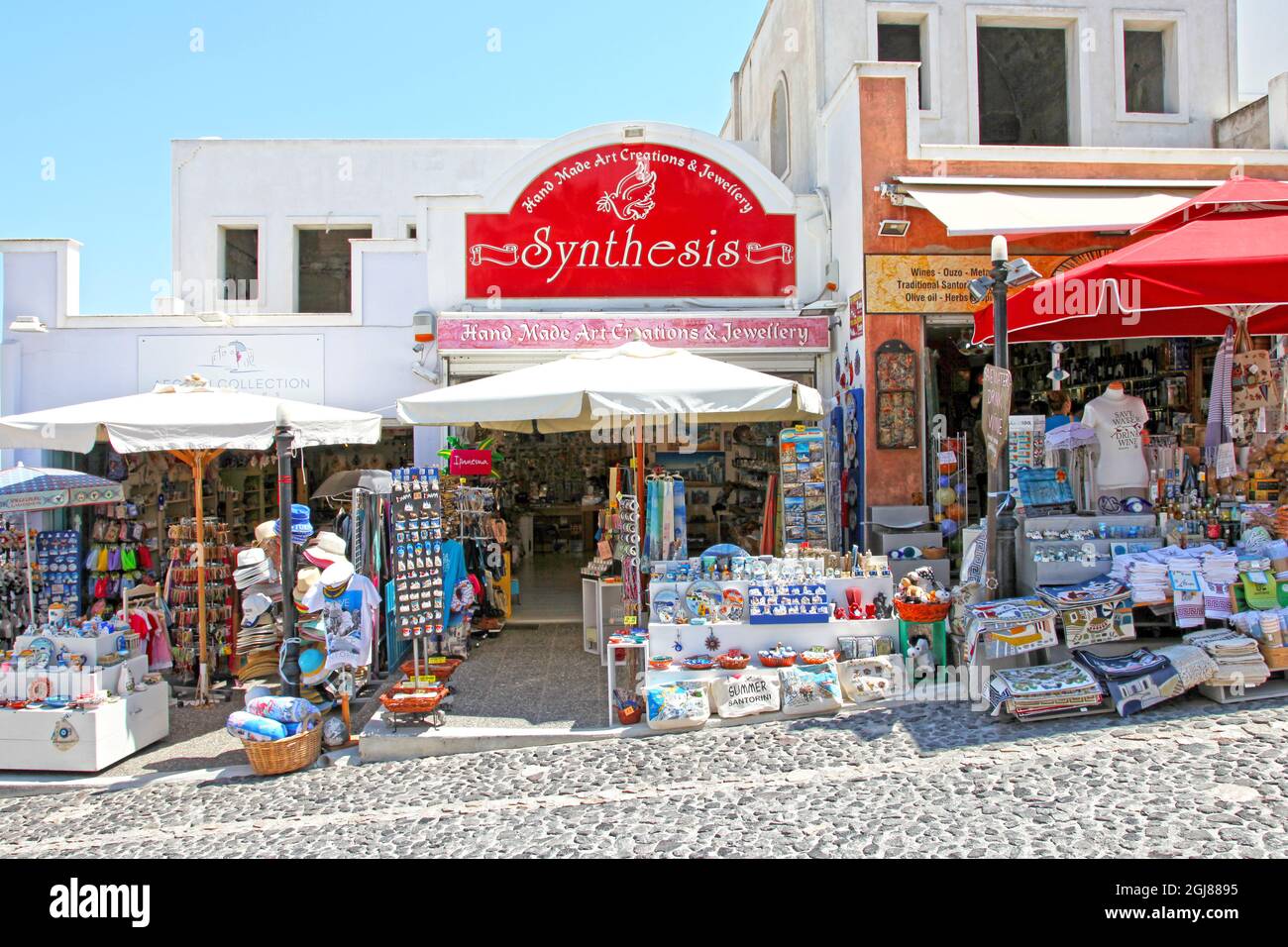 Souvenir shops in Fira on the island of Santorini in the Greek islands, Greece. Stock Photo