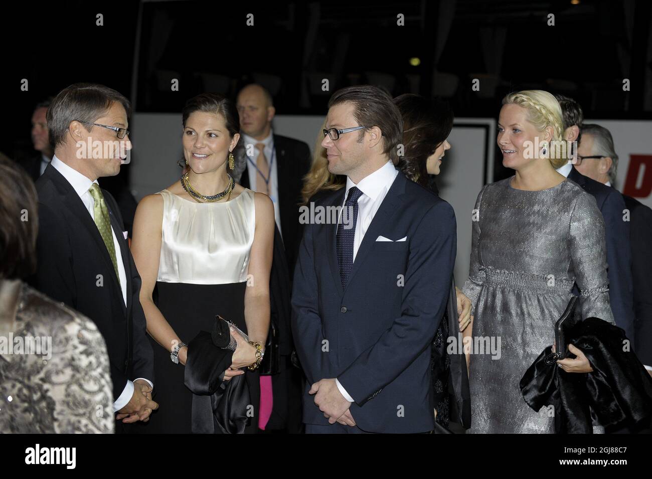 STOCKHOLM 20091119 Crown Princess Victoria of Sweden and her fiance Daniel Westling, Crown Princess Mette-Marit of Norway and other European royals are greeted by Swedish Minister of Social Affairs Goran Hagglund when they arrive to the Berwald Hall in Stockholm for a jubilee concert to celebrate the 20th Anniversary of the The United Nations Convention on the Rights of the Child (UNCRC). Foto: Pontus Lundahl / SCANPIX / code 10050  Stock Photo