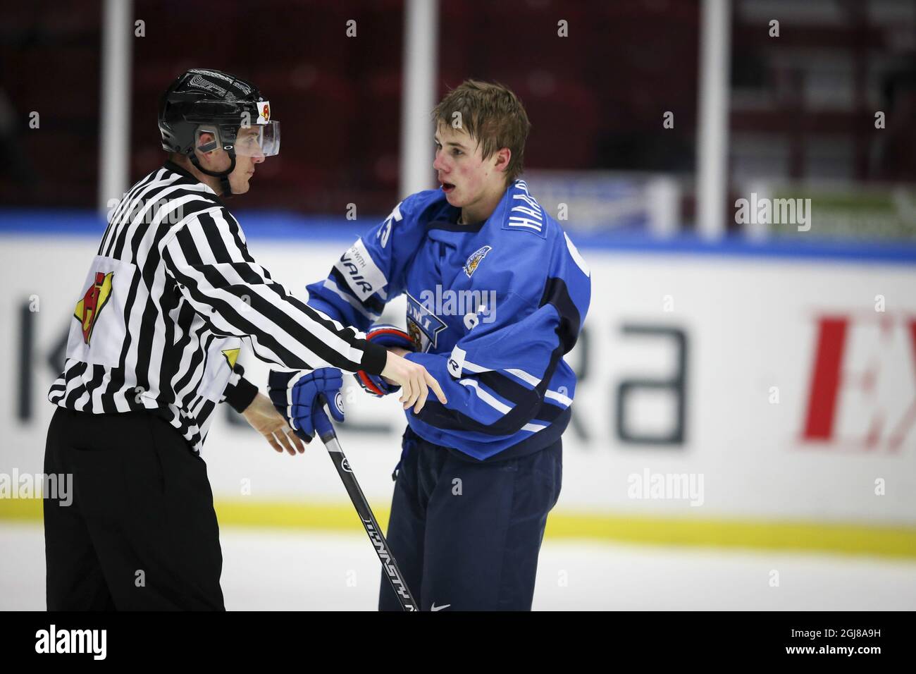 MALMO 2013-12-27 Finland's Henrik Haapala (R) gets a penalty during the World Junior Championship preliminary round icehockey match between Finland and Norway at Malmo Arena in Malmo, Sweden, on Dec. 27, 2013. Photo: Andreas Hillergren / TT / code10600  Stock Photo