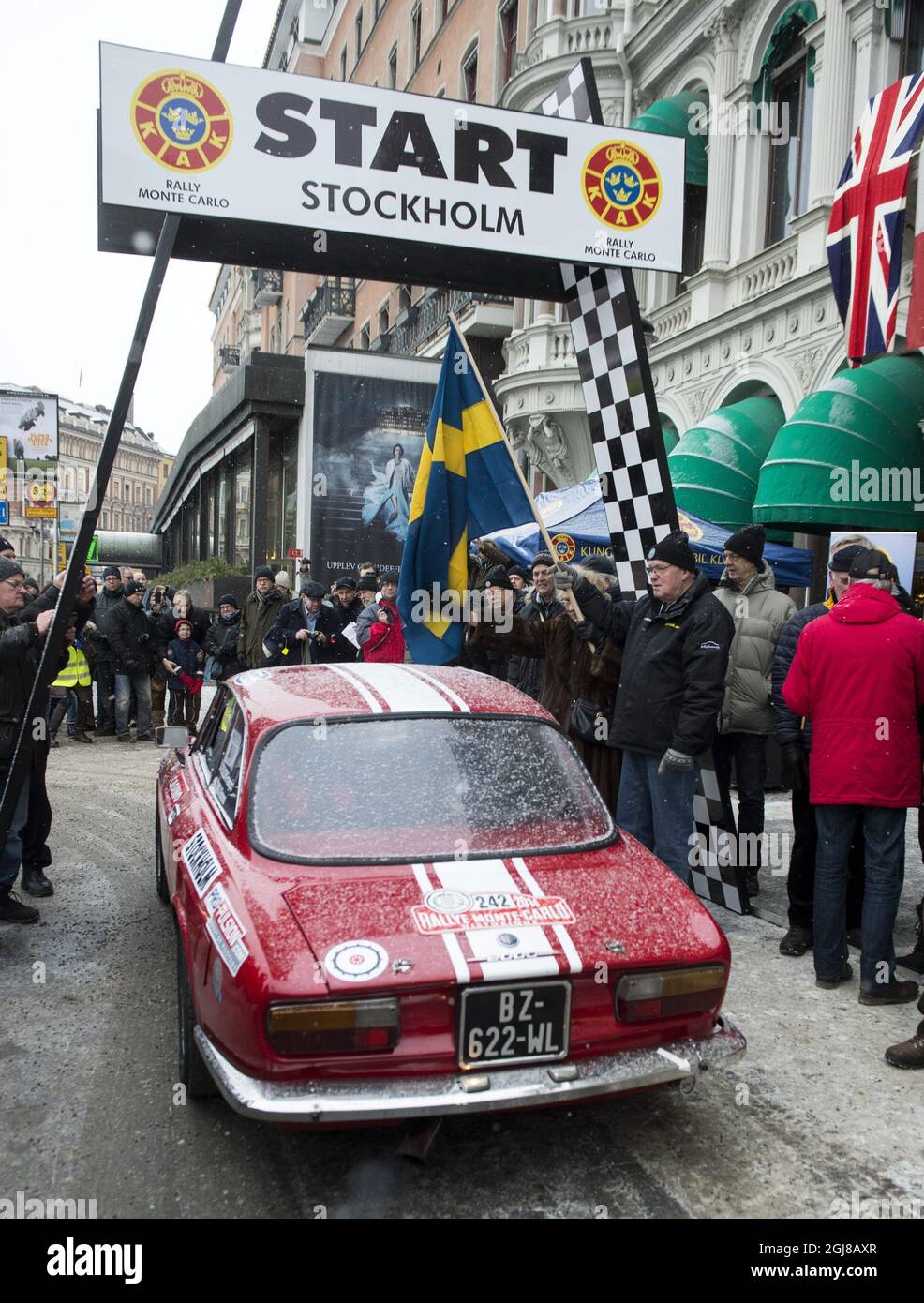 STOCKHOLM 20140123 Rallye Monte Carlo Historique 2014. One of the starts in the Monte-Carlo Rally for historic cars occurred in front of the Grand Hotel in Stockholm on Thursday, 23 January, 2014. On the way down to the continent the cars will stop at Vastana Castle in Granna and the Volvo Museum in Gothenburg. Foto Bertil Enevag Ericson / TT / kod 10000  Stock Photo
