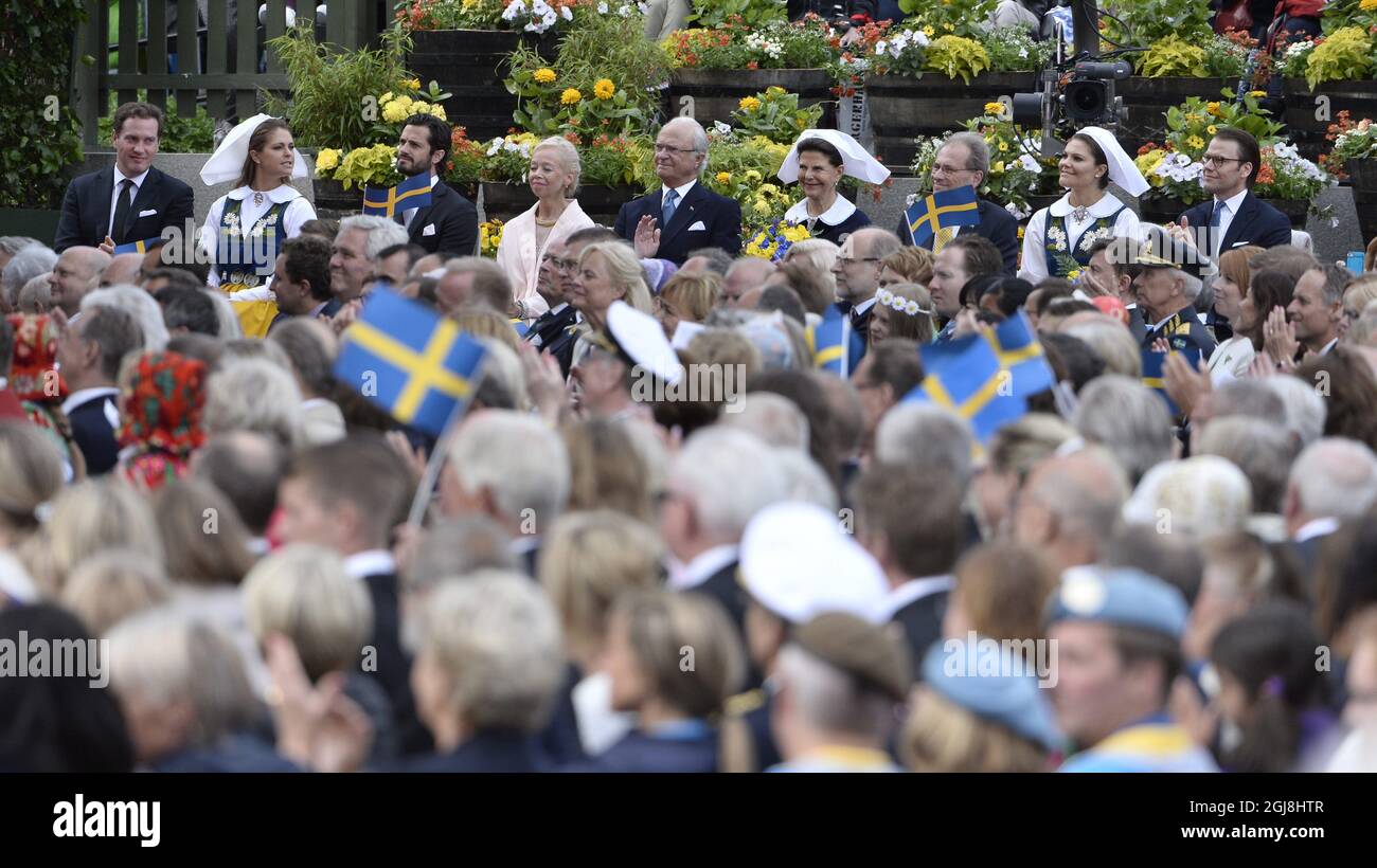 STOCKHOLM 2014-06-06 Mr Christopher O'Neill, Princess Madeleine, Prince Carl Philip, wife of the speaker of the parliament Ylwa Westerberg, King Carl XVI Gustaf, Queen Silvia, speaker of the parliament Per Westerberg, Crown Princess Victoria and Prince Daniel during the Swedish National Day celebrations at the Skansen open-air museum in Stockholm, Sweden, June 6, 2014. Photo: Claudio Bresciani / TT / Code 10090 Stock Photo