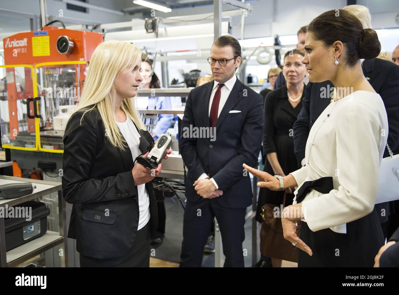 REYKJAVIK 20140618 Crown Princess Victoria and Prince Daniel are shown a bionic leg at the Ossur prosthetics company in Reykjavik, Iceland, June 18, 2014. The Crown Princess couple is on a two day official visit to Iceland. Foto: Pontus Lundahl / TT / kod 10050  Stock Photo