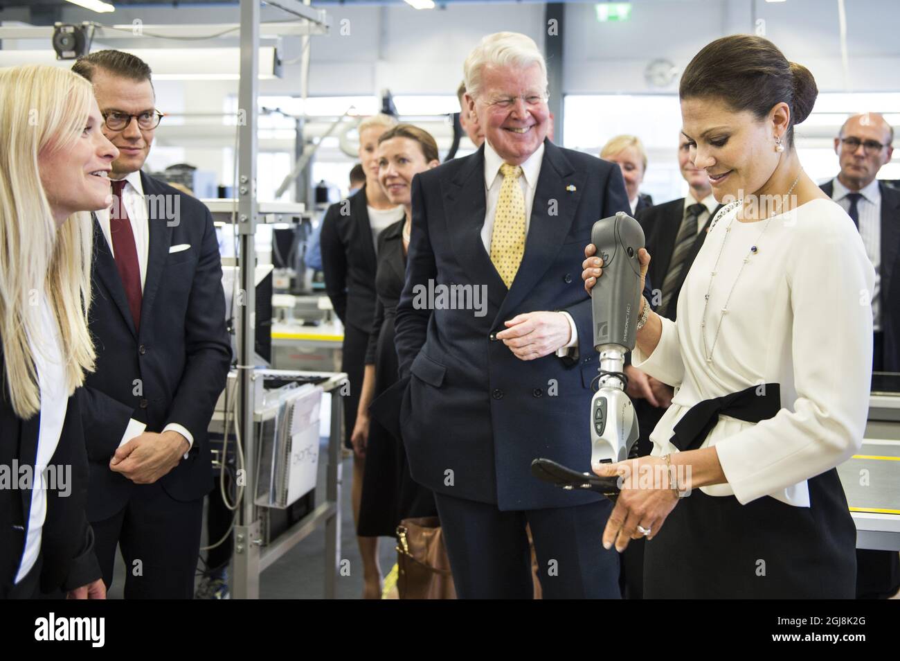 REYKJAVIK 20140618 Crown Princess Victoria and Prince Daniel are shown a bionic leg at the Ossur prosthetics company in Reykjavik, Iceland, June 18, 2014. The Crown Princess couple is on a two day official visit to Iceland. Foto: Pontus Lundahl / TT / kod 10050  Stock Photo