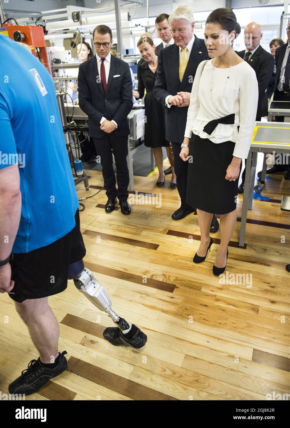 REYKJAVIK 20140618 Crown Princess Victoria and Prince Daniel are shown a bionic leg at the Ossur prosthetics company in Reykjavik, Iceland, June 18, 2014. The Crown Princess couple is on a two day official visit to Iceland. Foto: Pontus Lundahl / TT / kod 10050  Stock Photo