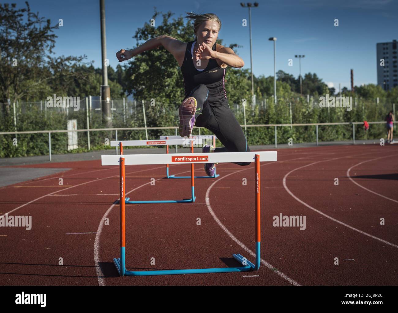 STOCKHOLM 2014-09-08 fotodate 2014-09-02 Bianca Salming is seen during her  decathlon practice with mon Katarina Pettersson and trainer Vlad Petrovic  in Stockholm. Sweden, September 8, 2014. Bianca is daughter of Borje Salming