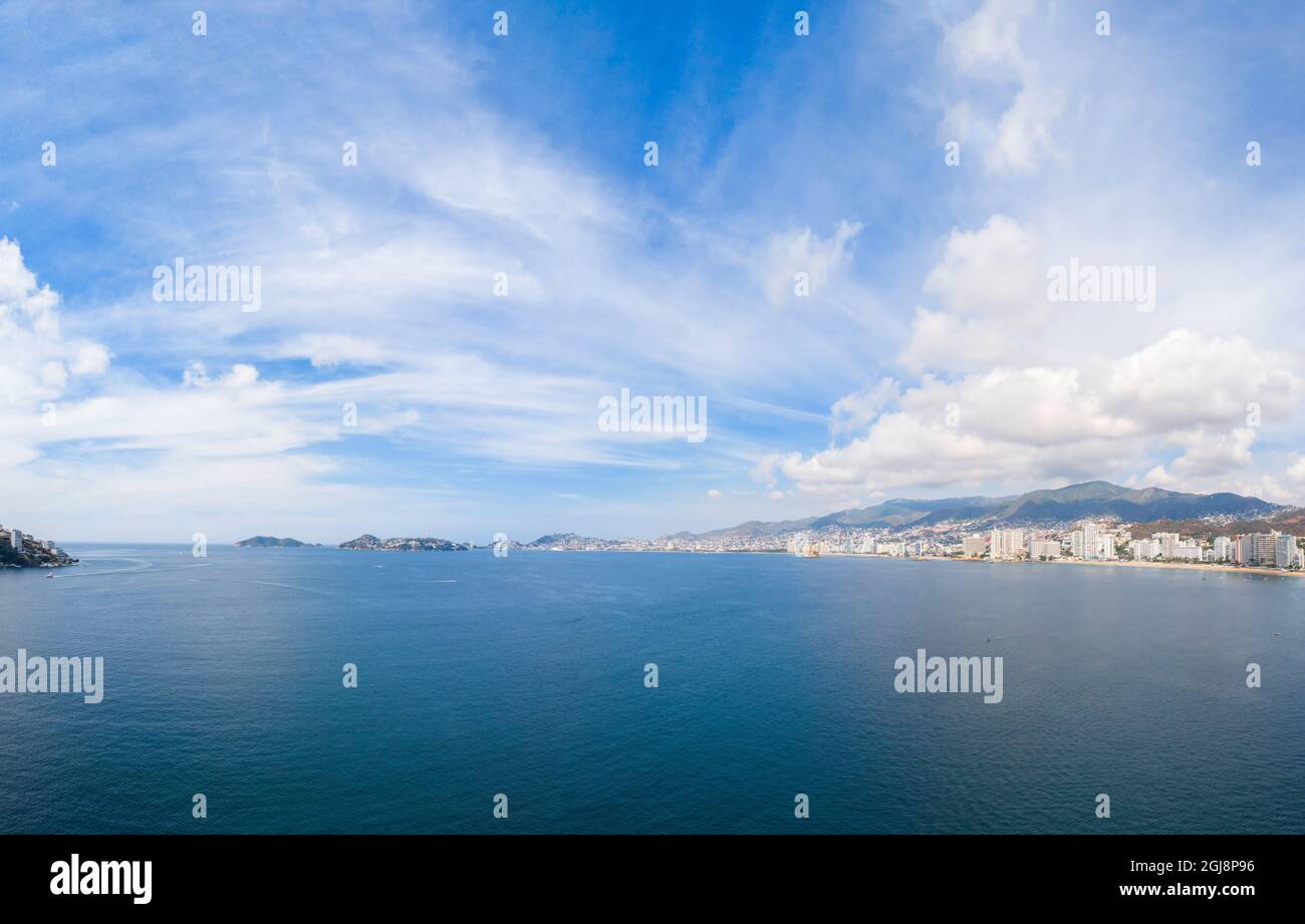 Cloudy blue sky over the sea in summer Stock Photo - Alamy