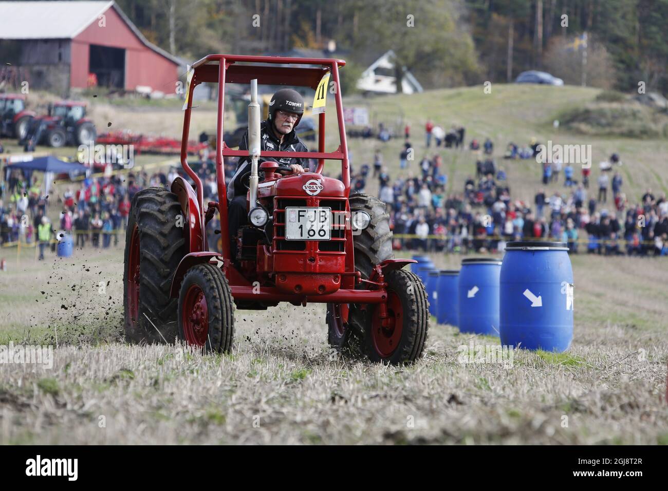 USPASTORP 2014-10-04 Leif Andersson on a Volvo Krabat 1957 participate in the parallel slalom race with tractors that must be at least 30 years old during the Swedish Championship in Stubble Race in Uspastorp north of Kungalv. The first race was in 2007. Foto: Henrik Brunnsgard / TT / kod: 11397  Stock Photo