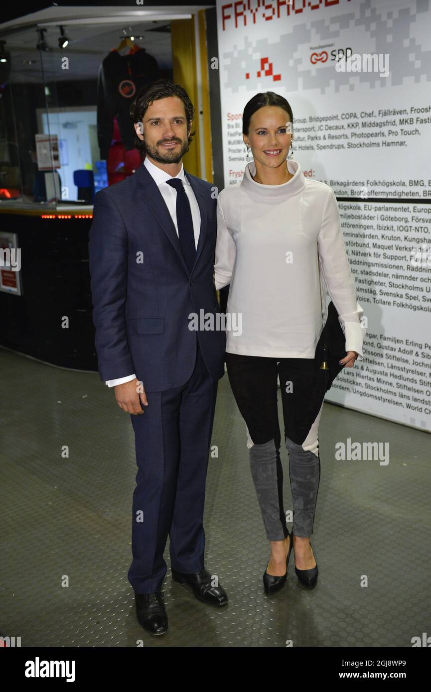 STOCKHOLM 20141119 Prince Carl Philip and Sofia Hellqvist arrive to  Sweden's Young Entrepreneurs 2014 at youth activity center Fryshuset in  Stockholm November 19, 2014. Photo: Henrik Montgomery / TT / kod: 10060  Stock Photo - Alamy