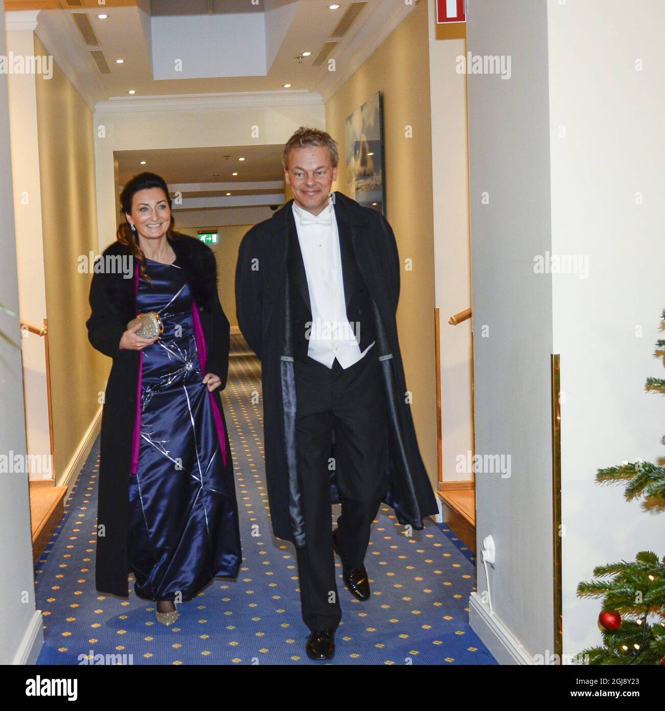STOCKHOLM 2014-12-10 The 2014 Nobel Physiology or Medicine laureates Edvard Moser och May-Britt Moser is seen leaving Grand Hotel for the Nobel ceremony in Stockholm,Sweden, Decemeber 10, 2014.The couple has been awarded the Nobel Price in Physiology or Medicine for their discoveries of cells that constitute a positioning system in the brain. They share the price with American British John O Keefe. Foto: Maja Suslin / TT / kod 10300  Stock Photo