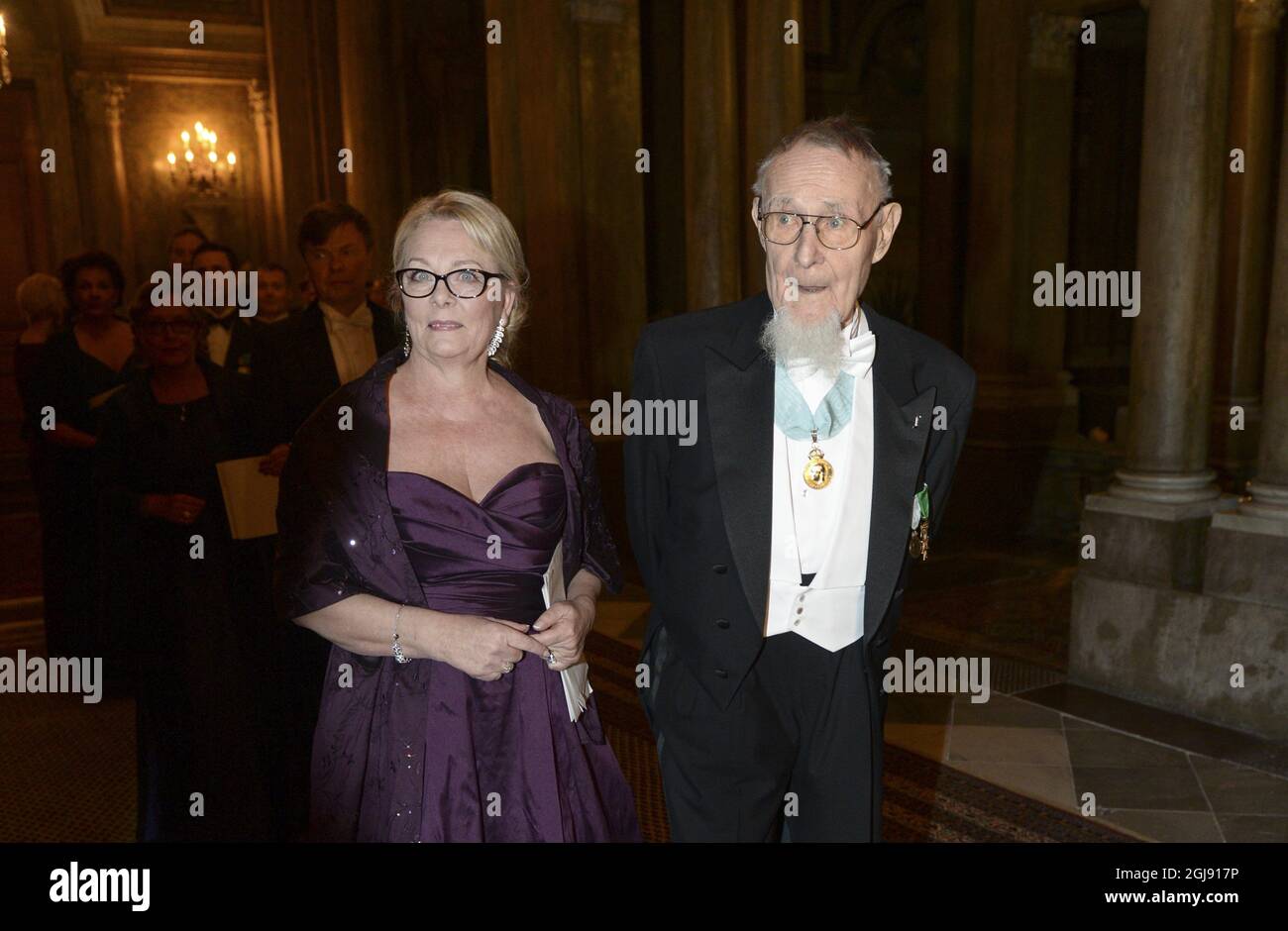 STOCKHOLM 2015-02-11  IKEA founder and owner Ingvar Kamprad and his assistant Eva Lundell Fragniere  arriving to a reception dinner held on Wednesday Feb. 11, 2015 at the Royal Palace in Stockholm, Photo Fredrik Sandberg / TT / kod 10080 Stock Photo