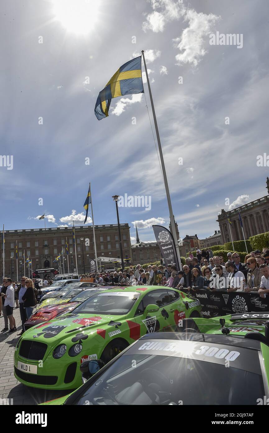 STOCKHOLM 2015-05-24 Onlookers wait for the annual international rally  Gumball 3000 sto start from Norrbro in central Stockholm on Sunday May 24,  2015. This year the route is from Stockholm via Oslo,