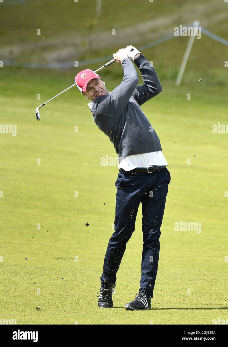 Sweden's Prince Daniel (L) plays with Swedish golfer Henrik Stenson during  the Nordea Masters official Pro-Am ahead of the Nordea Masters PGA Sweden  National European Tour tournament at Bara outside Malmo in