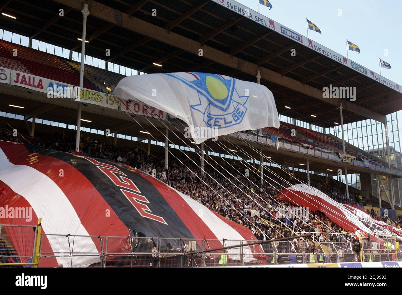 Assyriska fans cheer on their team Stock Photo - Alamy