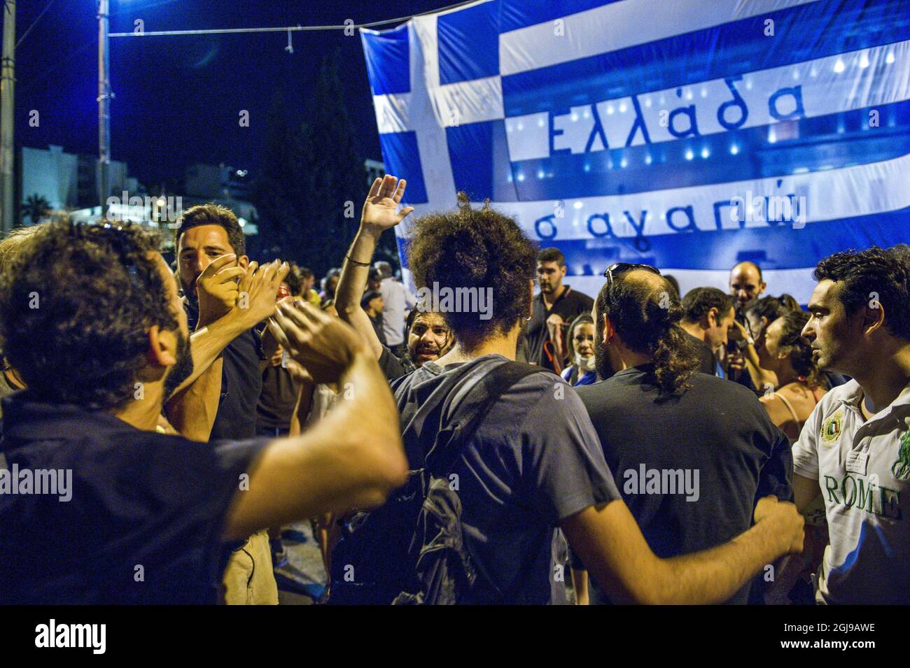 ATEN 2015-07-15 Anti-EU protesters and riot police on the street of ...