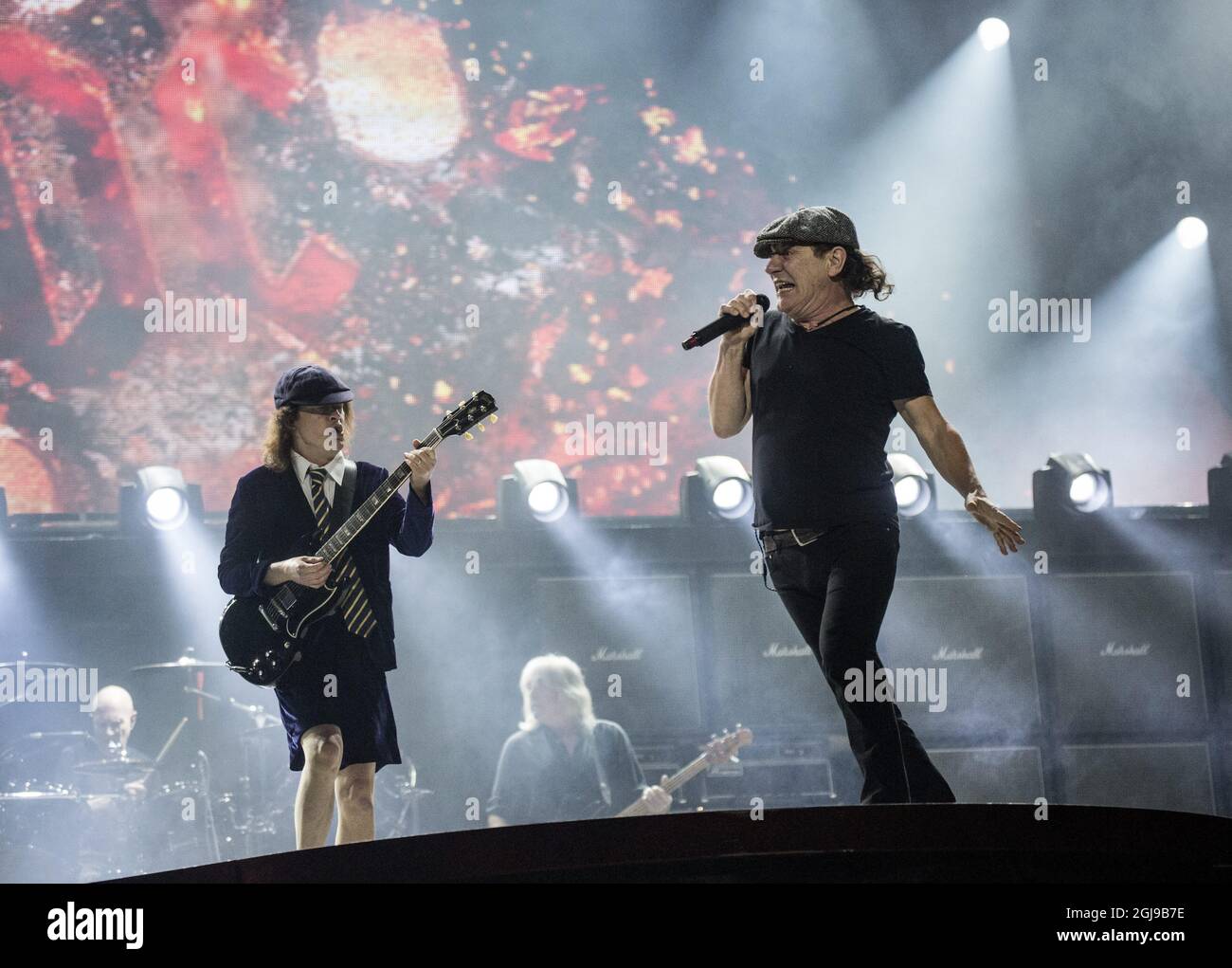 STOCKHOLM 2015-07-19 AC/DC:s Angus Young (guitar) and Brian Johnson (vocal) during the bands performance at Friends arena in Solna, Stockholm this sunday. Foto: Christine Olsson / TT / Kod 10430  Stock Photo