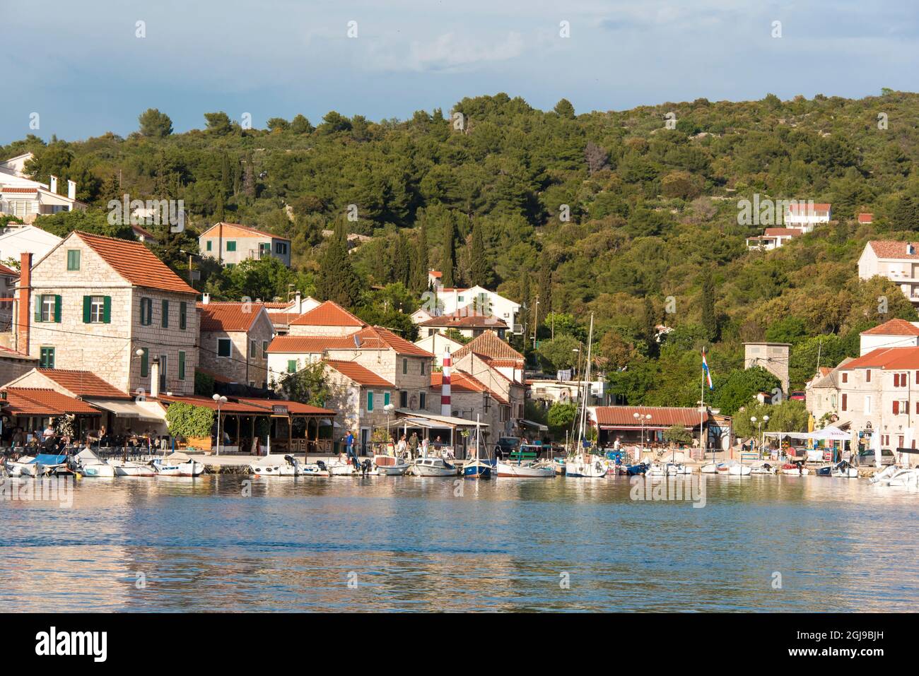 Croatia, Maslinica, Solta Island Fishing village popular with charter boats provides cafes and provisioning. Stock Photo