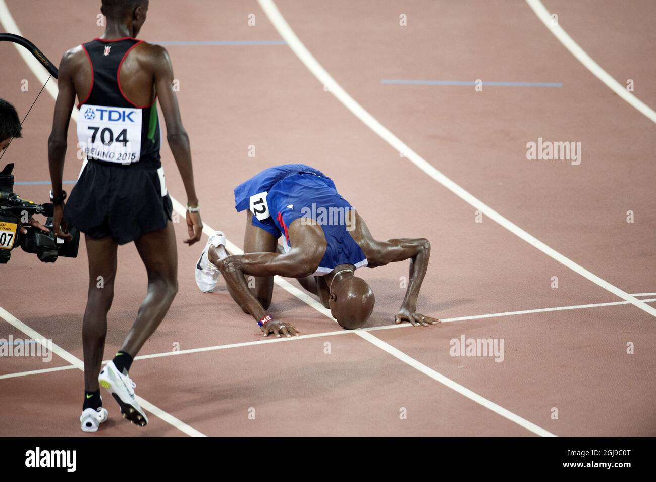 BEIJING 20150822 Mohamed Farah of Great Britain reacts after winning the men's 10000m final during the Beijing 2015 IAAF World Championships at the National Stadium in Beijing, China, August 22, 2015. Photo: Jessica Gow / TT / Kod 10070  Stock Photo