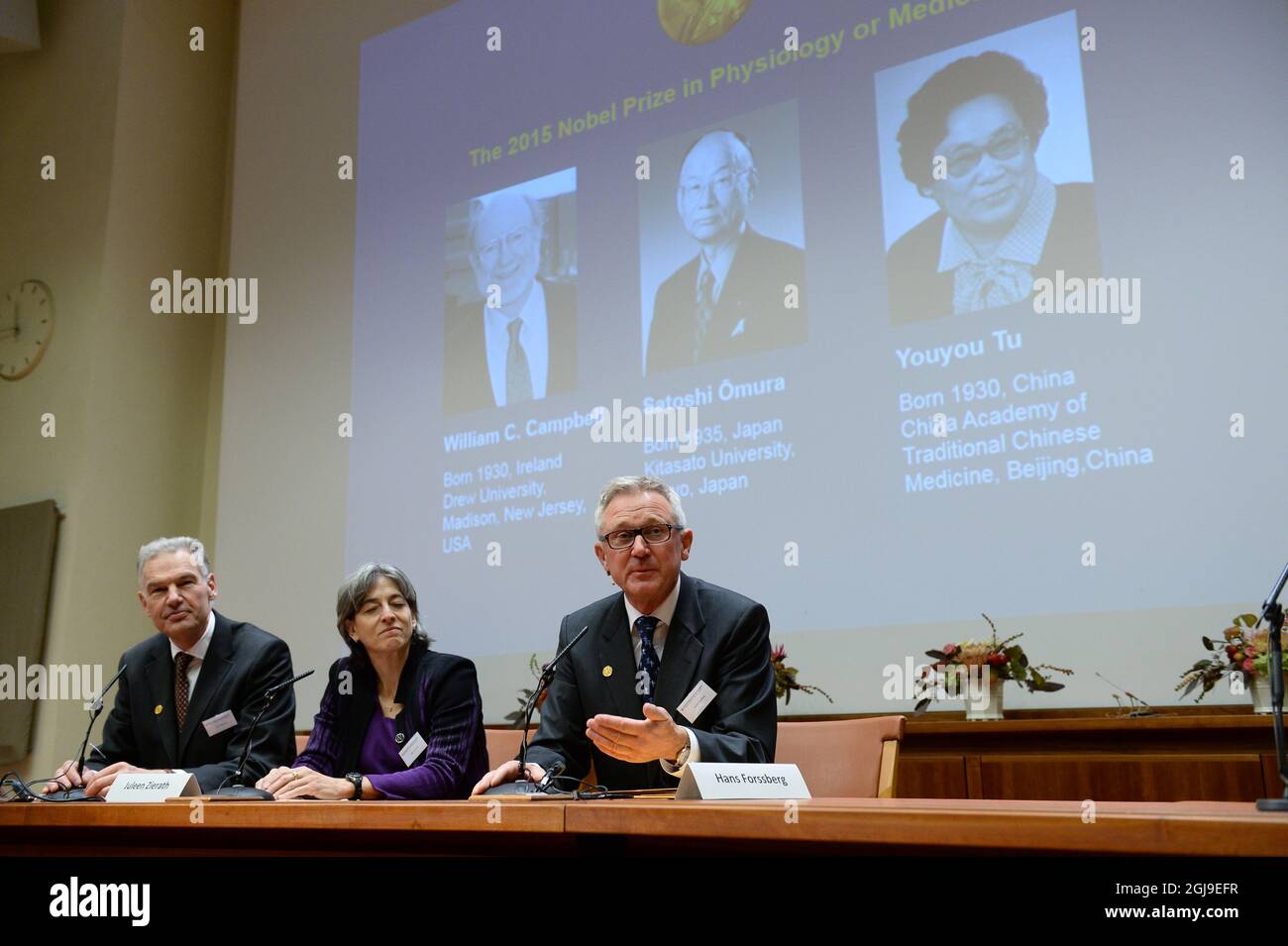 STOCKHOLM 2015-10.05 Prifessors Jan Andersson Juleen Zierath and Hans Forssberg of the Nobel Committee are seen during the announcement of the The Nobel Prize in Physiology or Medicine 2015 at the karolinska Instutute in Stockholm,Sweden, October 5, 2015. The prize was awarded with one half jointly to William C. Campbell and Satoshi Omura for their discoveries concerning a novel therapy against infections caused by roundworm parasites and the other half to Youyou Tu for her discoveries concerning a novel therapy against Malaria. Foto: Fredrik Sandberg / TT kod 10080  Stock Photo