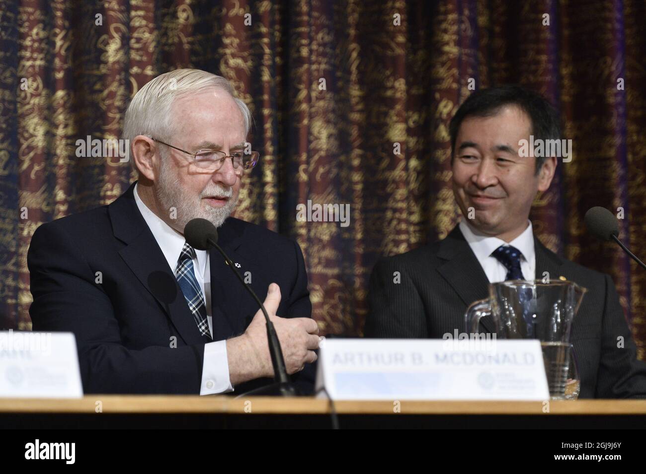Nobel laureates in physics William C. Campbell, Drew University, Madison, NJ, USA, Nobelpristagare i fysiolog, and Takaaki Kajita, University of Tokyo, Kashiwa, Japan, during a press conference at the Royal Swedish Academy of Science in Stockholm, December 7, 2015. Photo: Anders Wiklund / TT  Stock Photo