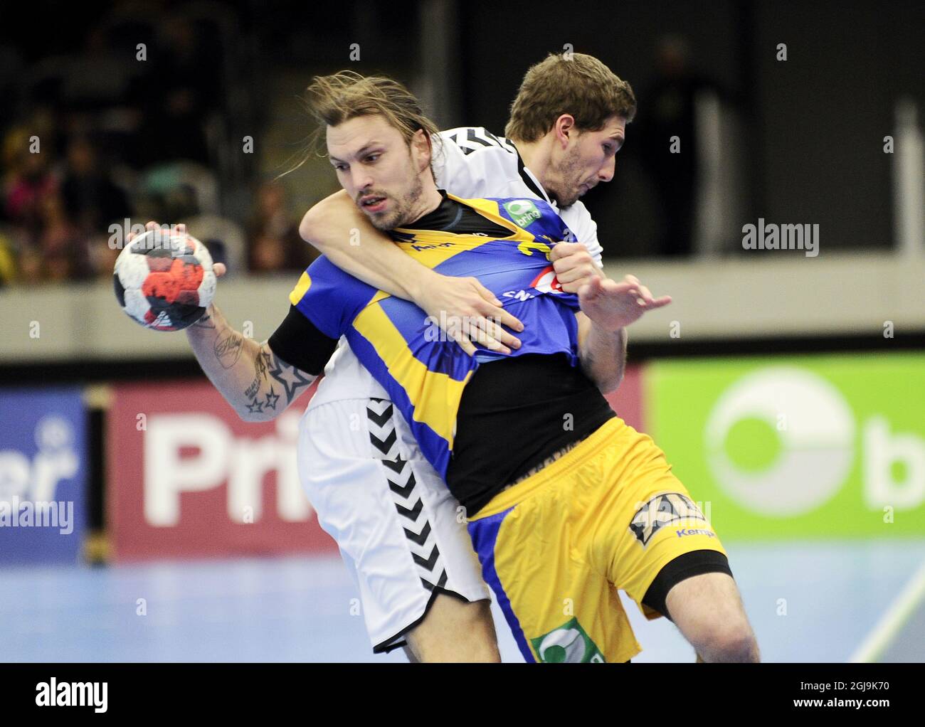 MALMÃƒÂ– 20160105 Sweden's Fredrik Petersen fights for the ball with Czech Miroslav Jurka during the friendly handball match between Sweden and Czech Republic in Malmo, Sweden, on Jan. 05, 2016. Photo: Bjorn Lindgren / TT / code 9204  Stock Photo