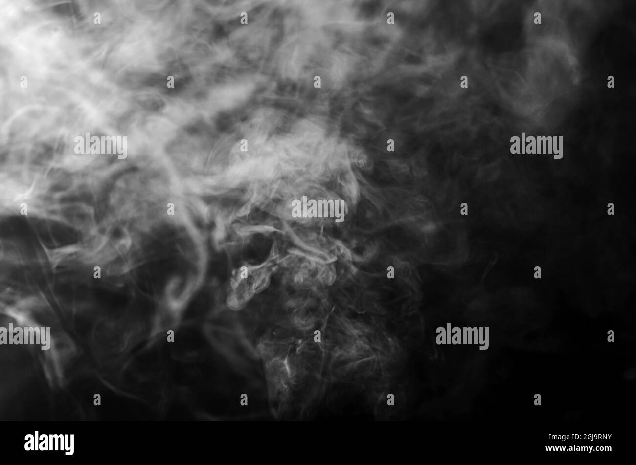 Dynamic Abstract Fog White Smoke Emanating From A Black Background