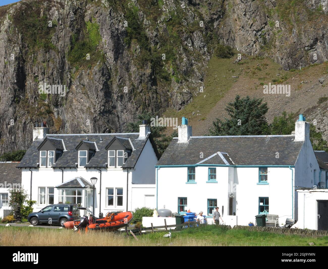 Traditional stone houses in a whitewash render sit at the foot of