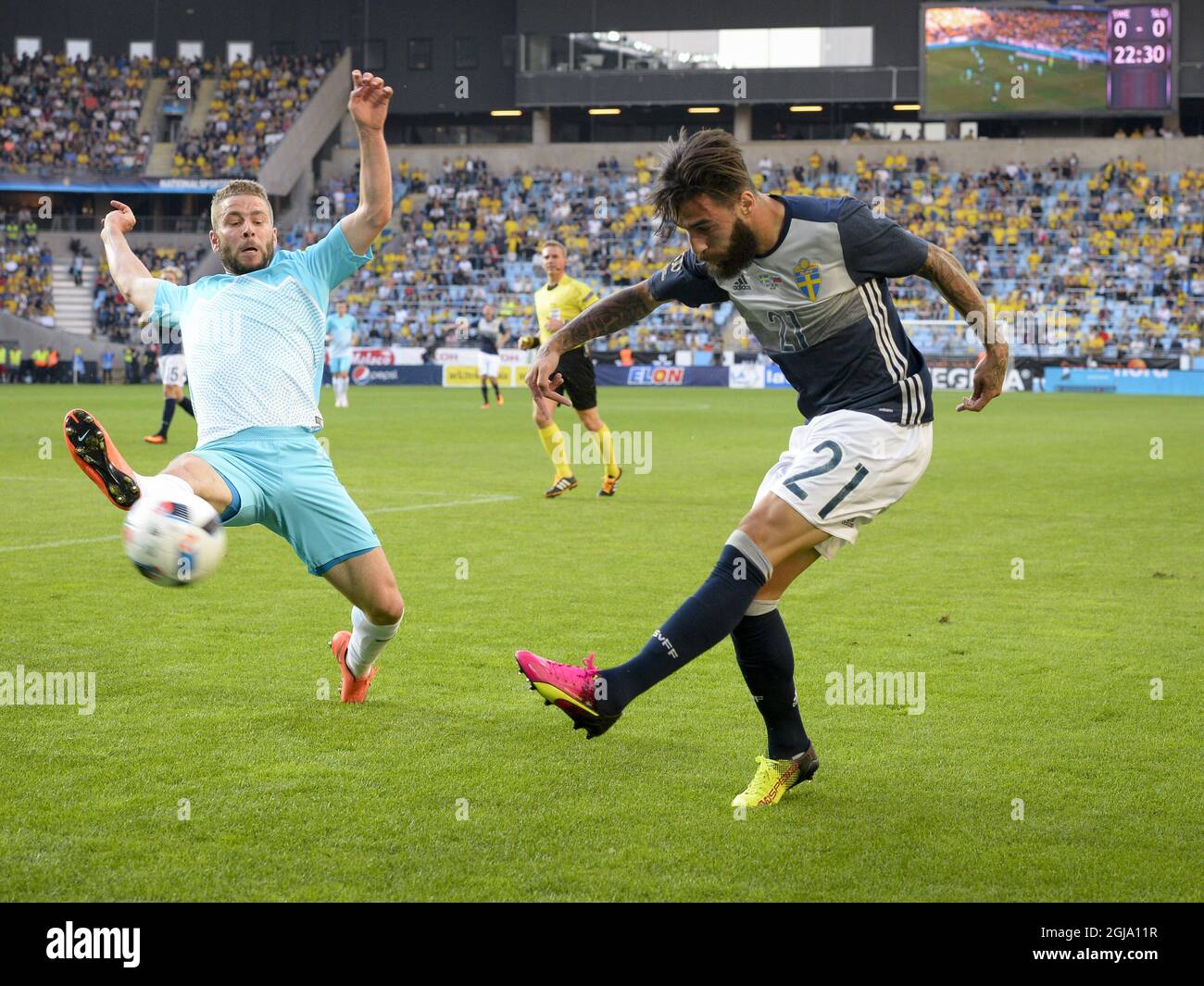 Slovenia's Nejc Skubic (L) fight for the ball against Sweden's Jimmy Durmaz during the friendly soccer match betweeen Sweden and Slovenia at Swedbank Stadion in Malmo, Sweden, on May 30, 2016. Photo: Anders Wiklund / TT / code 10040  Stock Photo