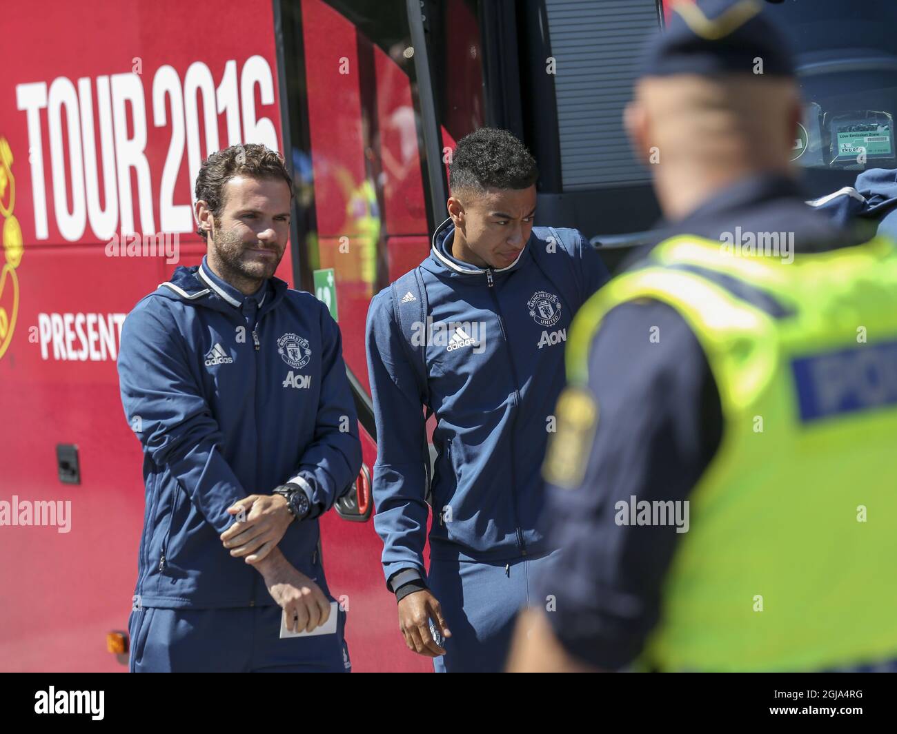 Manchester United's midfielders Juan Mata and Jesse Lingard exit the team coach at the hotel in Goteborg on July 30, 2016. The Manchester team will meet Turkey's Galatasaray in a friendly in Goteborg Saturday, July 30, 2016. Photo Bjorn Larsson Rosvall / TT / code 9200  Stock Photo
