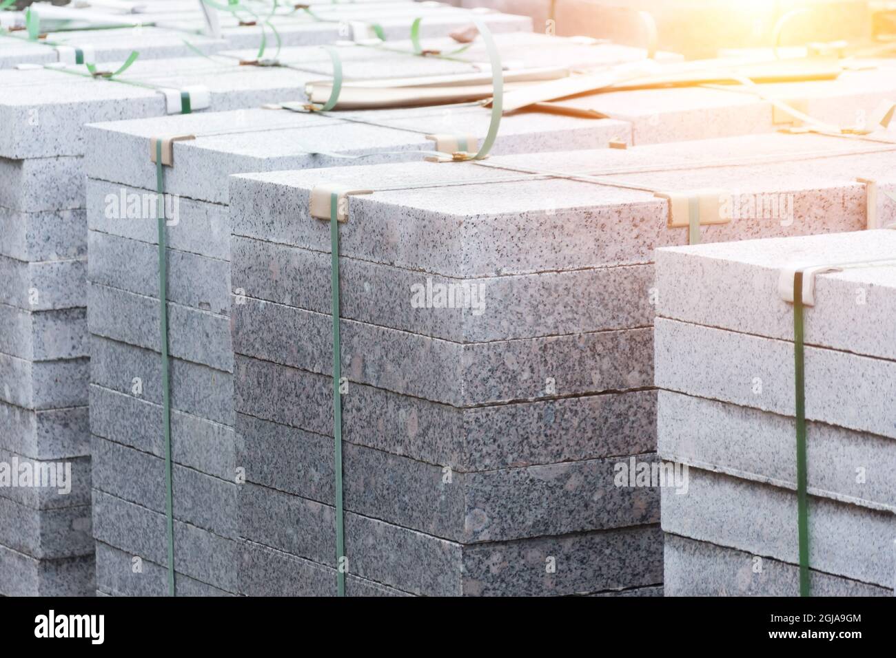 Marble slabs, paving stones, building material on pallets Stock Photo