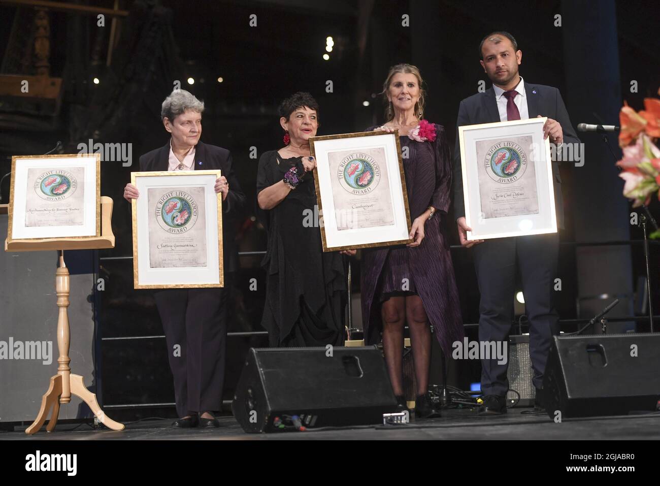 ADDING NAMES OF CUMHURIYET REPRESENTATIVES Left-right : Russian human rights activist Svetlana Gannushkina, Isil ÃƒÂ–zgenturk and Zeynep Oral, center, of the Turkish newspaper Cumhuriyet, and Raed al-Saleh, head of the Syria Civil Defence, also known as the White Helmets, pose with their diplomas after receiving the Right Livelihood Award during a ceremony at the Vasa Museum in Stockholm, Sweden, on Nov. 25, 2016. The diploma far left is for Mozn Hassan, executive director of the women's rights group Nazra for Feminist Studies, who wasn't able to attend the award ceremony. Photo Fredrik Sandb Stock Photo