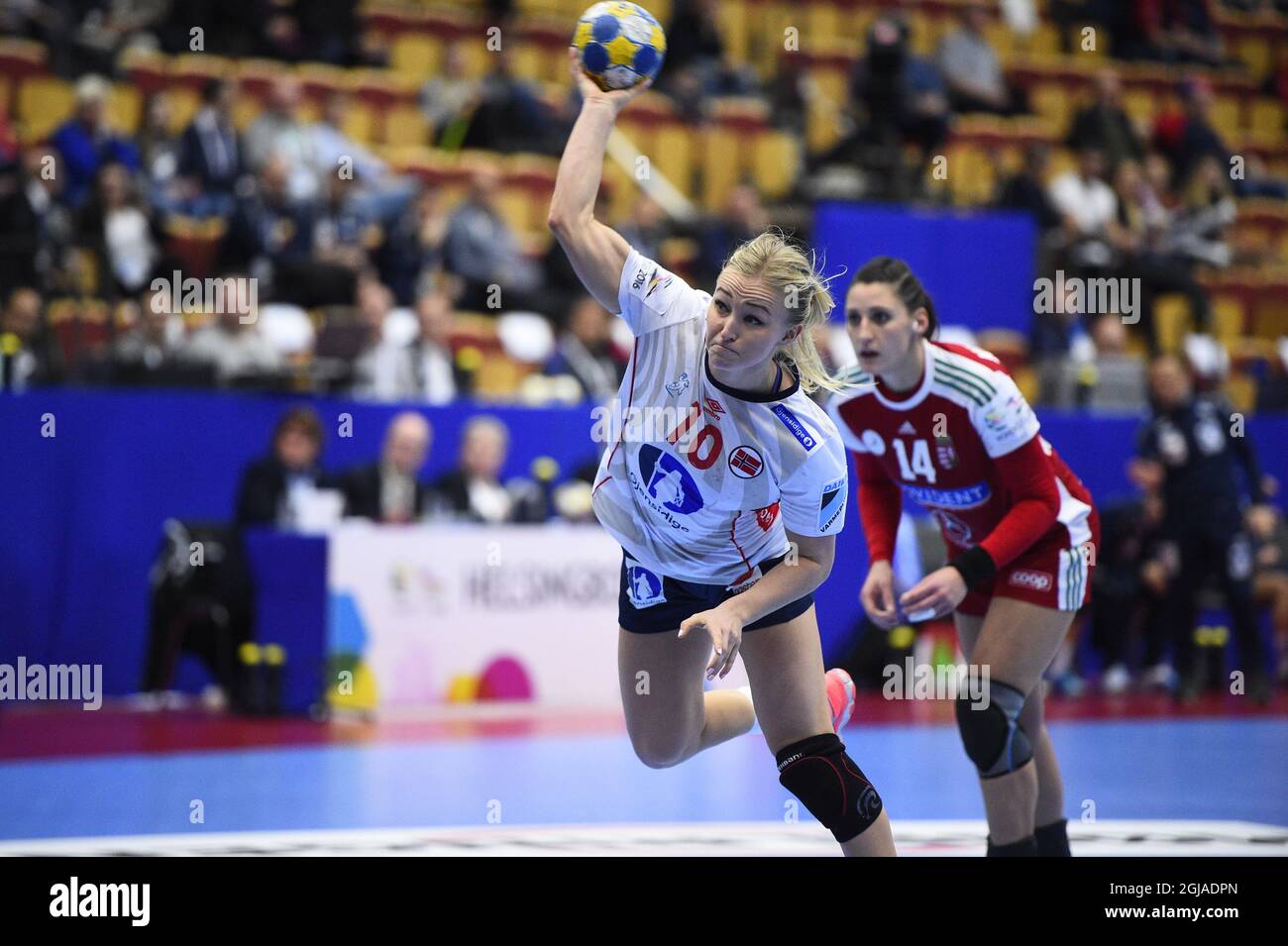 Norway's Stine Oftedal (L) oand Hungary's Anett Kisfaludy during the Women's European Handball Championship group 2 match between Hunary and Norway at Helsingborg Arena i Helsingborg, Sweden, on Dec. 13, 2016. Photo Emil Langvad / TT / code 9290  Stock Photo