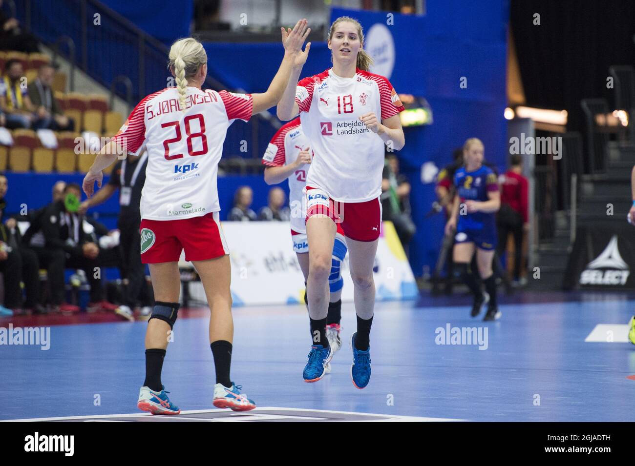 Denmark's Stine Joergensen (L) and Mette Tranborg celebrate during the Women's European Handball Championship group 2 main round match between Denmark and Romania at Helsingborg Arena in Helsingborg, Sweden, on Dec. 14, 2016. Photo: Emil Langvad / TT / code 9290  Stock Photo