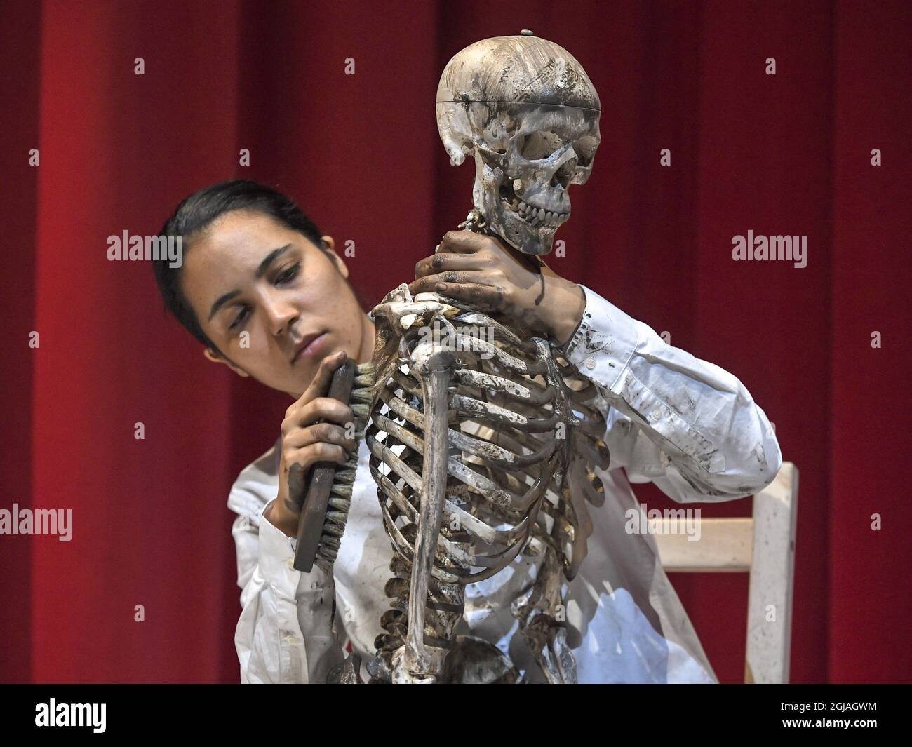 STOCKHOLM 20170216 Unidentified artist perform a work by artist Marina Abramovic at the press preview of the exhibition The Cleaner at Moderna Museet in Stockholm February 16, 2017. Foto: Claudio Bresciani / TT / kod 10090  Stock Photo