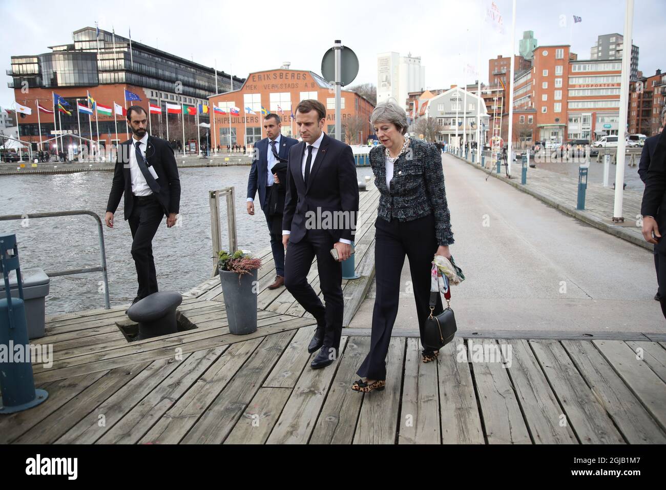 GOTHENBURG 2017-11-17 France's President Emmanuel Macron (L) and Britain's Prime minister Theresa May talk while walking to the luncheon during the European Social Summit in Gothenburg, Sweden, on November 17, 2017. Foto: Jonas Ekstromer / TT / kod 10030 Stock Photo