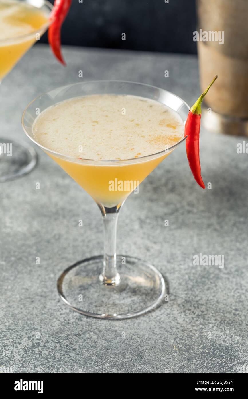 Boozy Refreshing Spicy Fifty Cocktail with Vodka and a Pepper Stock Photo