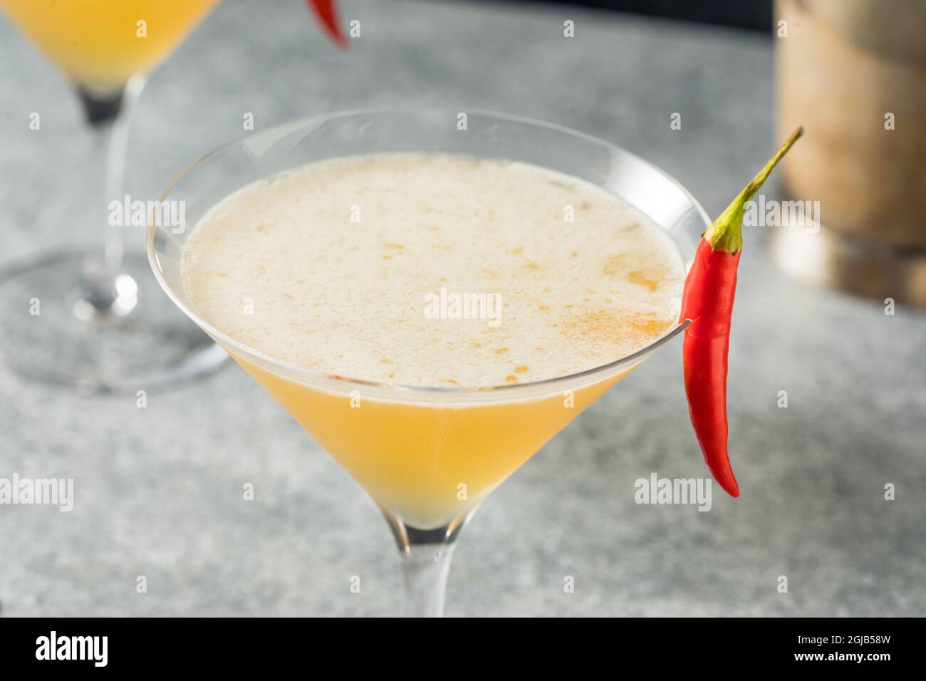 Boozy Refreshing Spicy Fifty Cocktail with Vodka and a Pepper Stock Photo