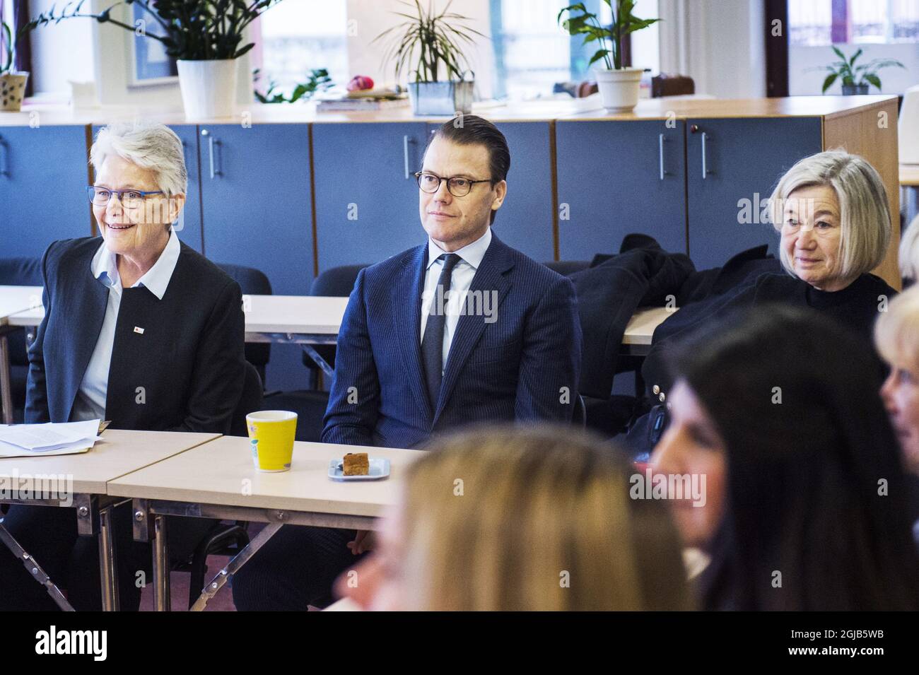 2018-02-15 Prince Daniel and Margareta Wahlstrom (left), Chair of Sweden's Red Cross, and Annelie Hultén, Covernor of Skane, during the visit to the Red Cross centre in on Thursday.